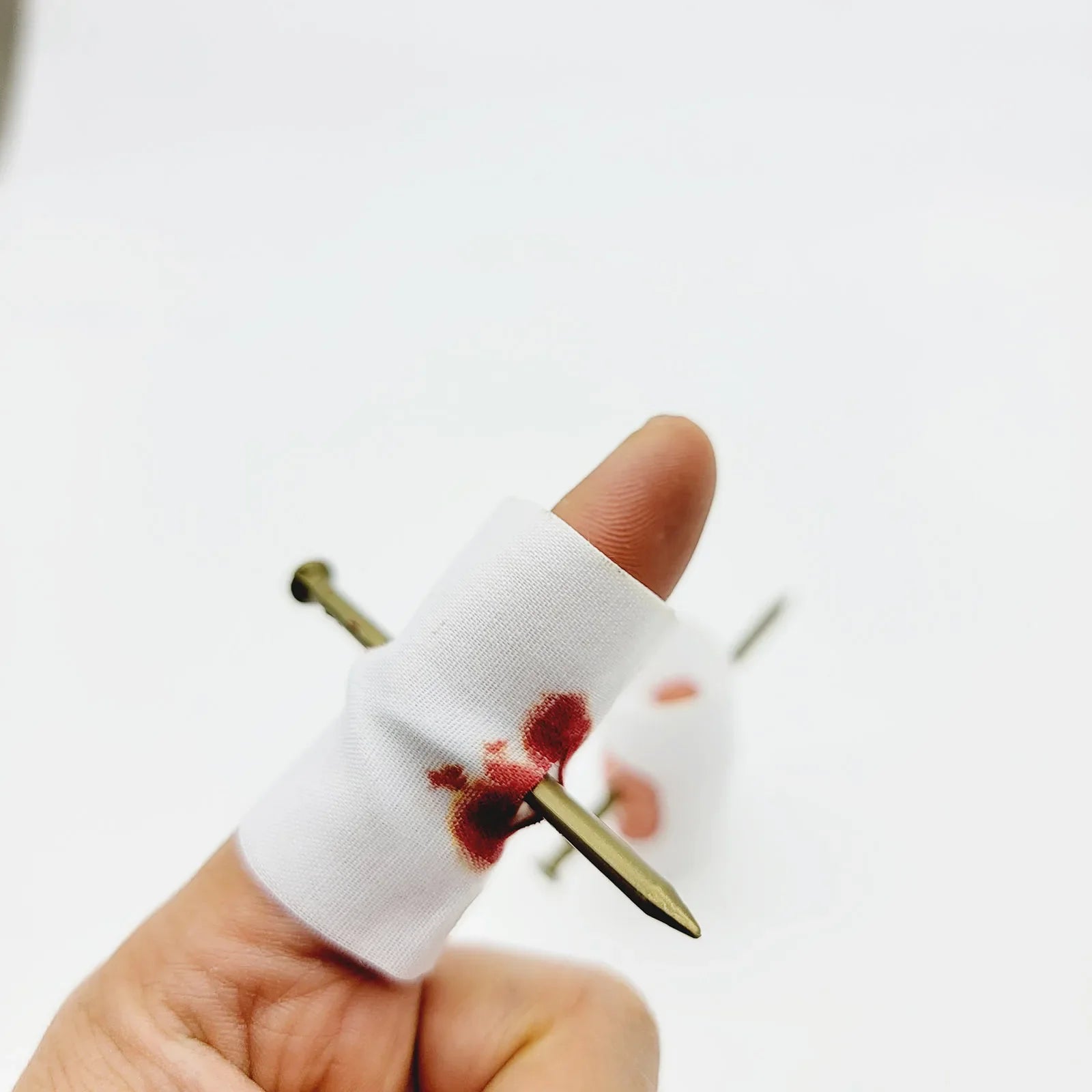 1PCS Fool Toys Blood Prank Magic Prop Joke Fake Nail Through Finger Magic Funny Gadgets Magic Trick toys - Square Deal Me